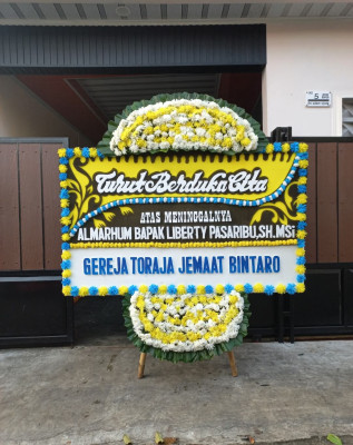 Papan Bunga Duka di Merapi Barat
